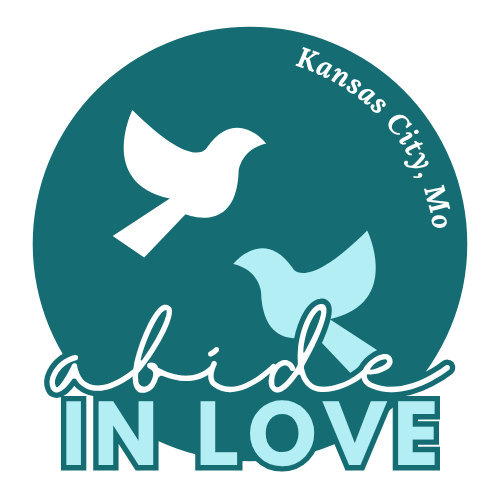 Two doves with the words Abide in Love Kansas City, MO